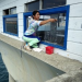 Thumbnail image for Window-Washer at OB Pier Cafe Loves Her New Job
